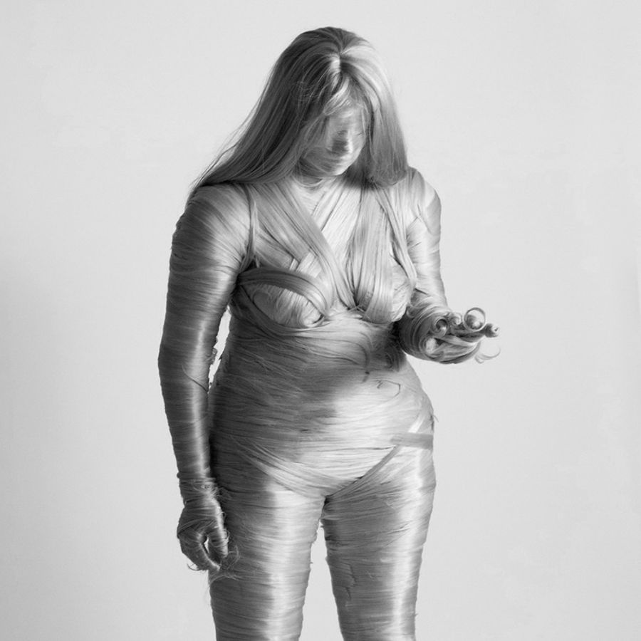 Exploring Humanity Through Synthetic Hair Sculptures