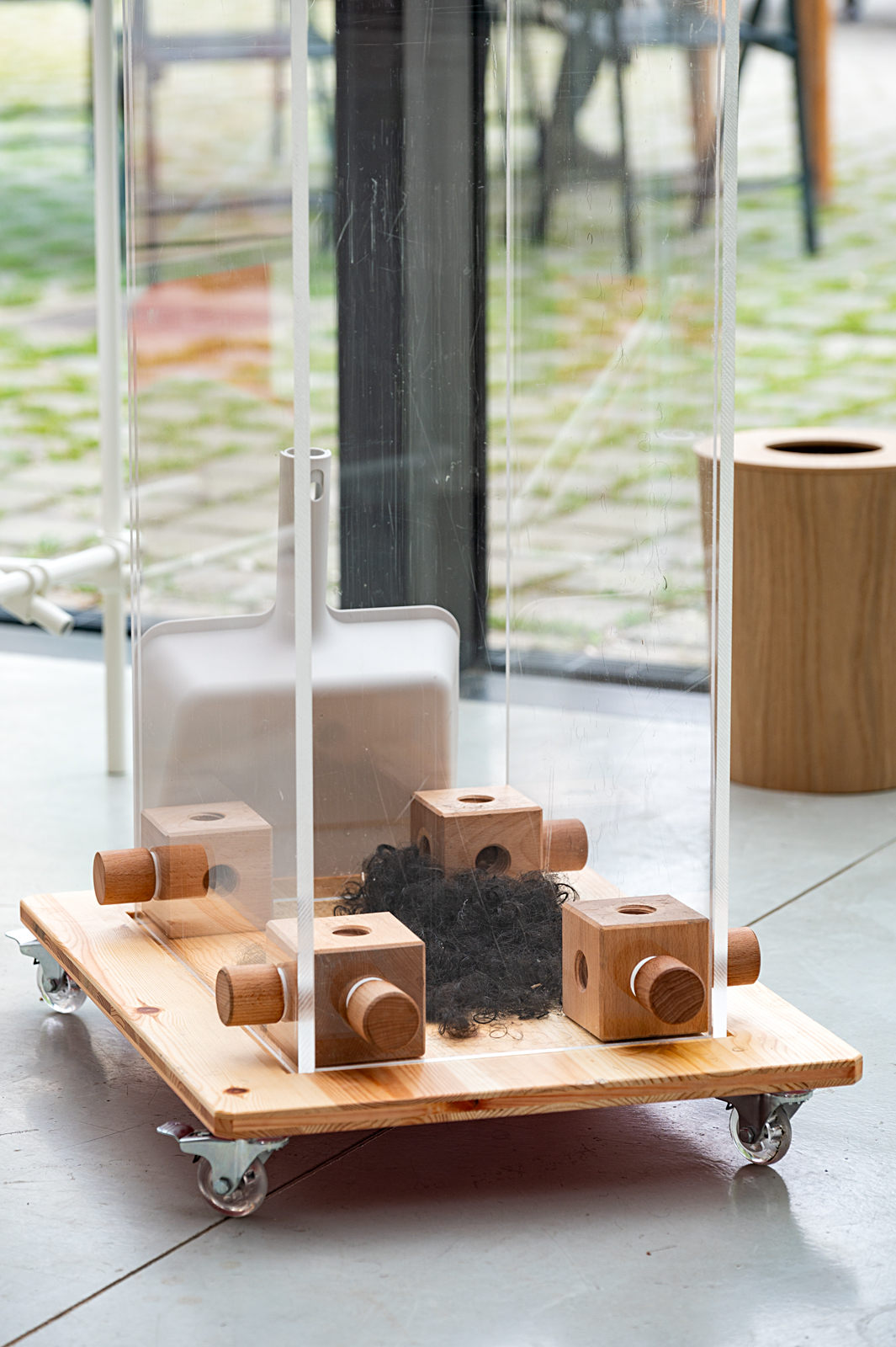 Display collecting donated hair at Milan Design Week