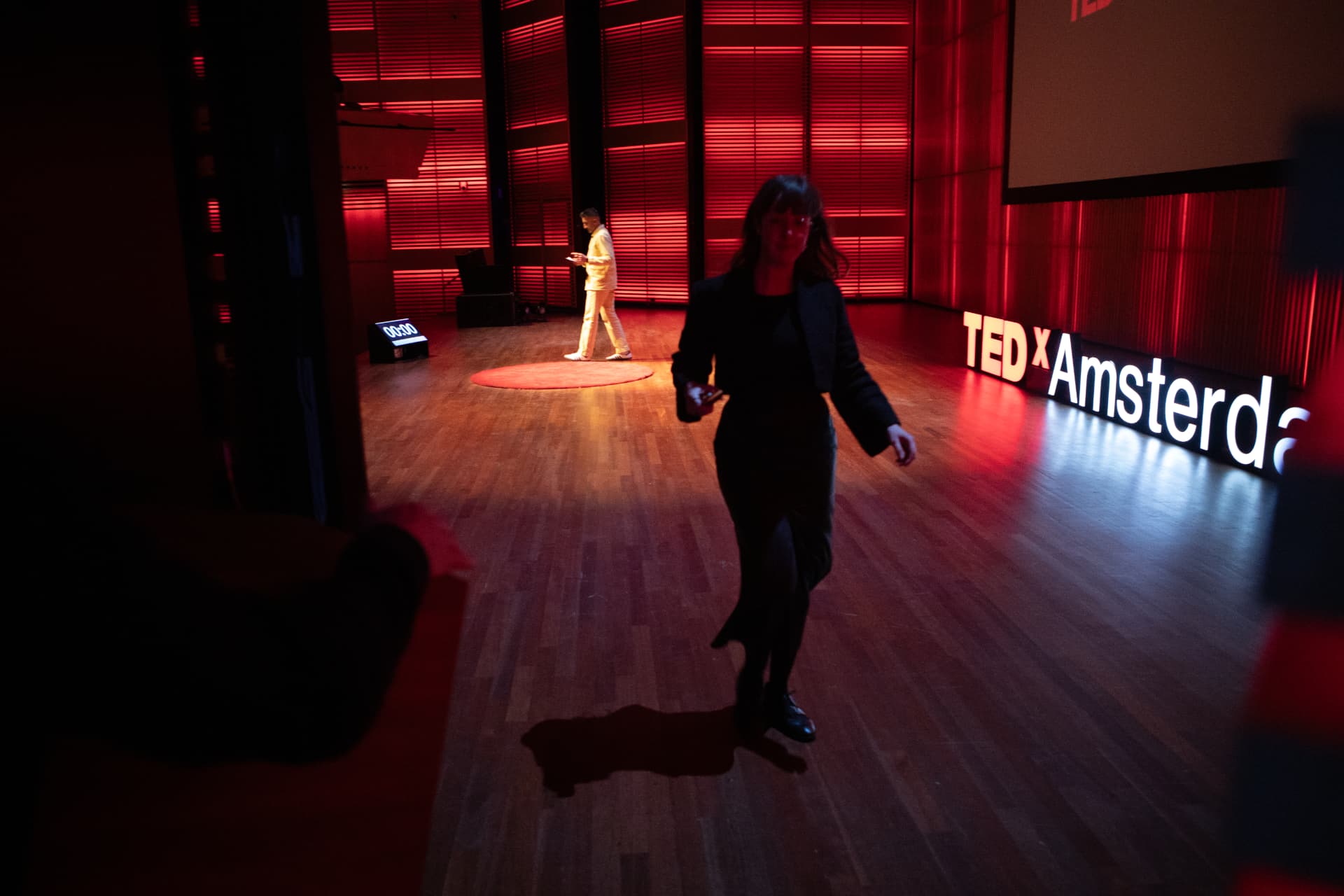 Zsofia Kollar walking off the TEDxAmsterdam stage